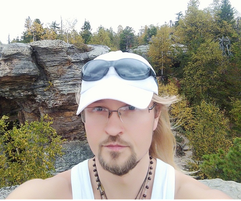 Александр Склюев